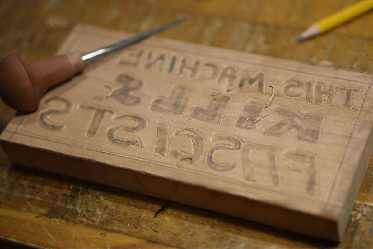 senseshaper's tweet photo. New #woodcut caption outlines carved. @WoodyGuthrieCtr #ThisMachineKillsFascists woodblock almost ready for action.

Been up since four; my fingers are blistered, but some new #art coming soon.

#WoodcutWednesday https://t.co/ZwsnjBay7i