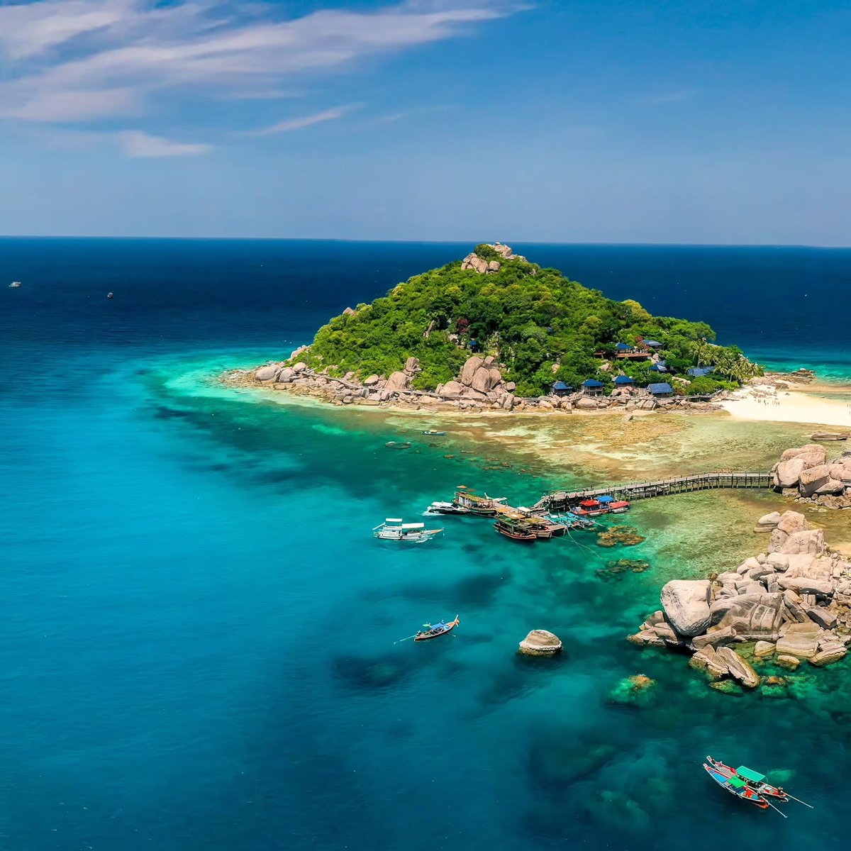 Daveee09's tweet photo. Swipe through paradise: Nang Yuan Island in three breathtaking frames. Turquoise waters, lush islets, and aerial serenity near Ko Tao, Thailand. https://t.co/MDcpFshehK