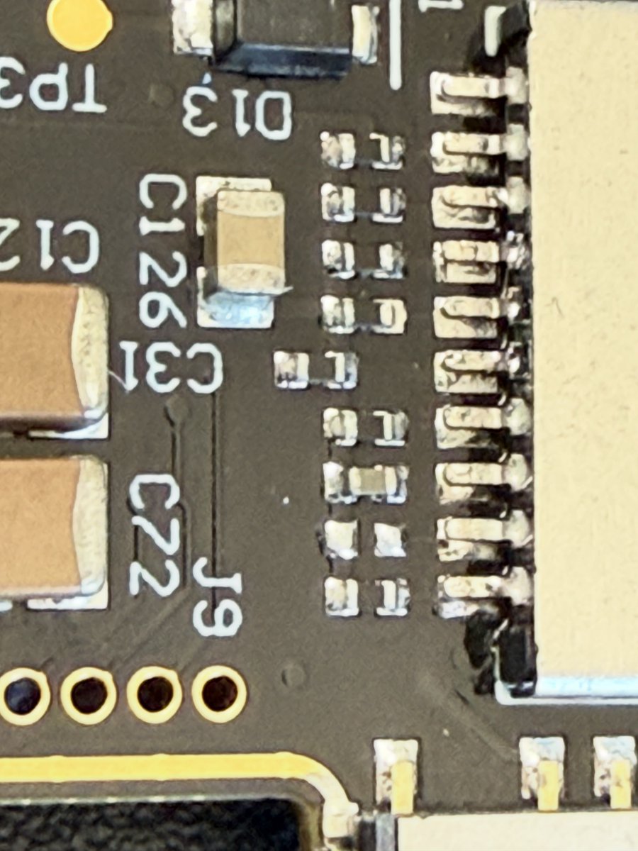 vaheder's tweet photo. pins with my multimeter. Is there any way I can get debug output from Chromagic to see what might be going on? The only obvious thing is there's no resistor on the DAT0 line, but I've seen that on other Chromatic boards as well. Thanks! https://t.co/6wgcKEXjEl