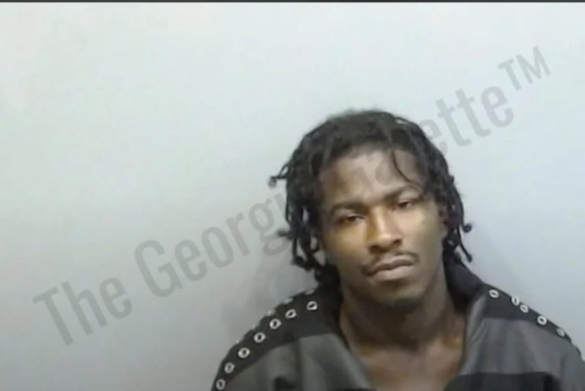 FearedBuck's tweet photo. Rapper Nino Paid’s mugshot has been released after he was extradited from Detroit to Fulton County Jail in Atlanta to face murder, armed robbery, and aggravated assault charges. https://t.co/kJG7ArRWBW