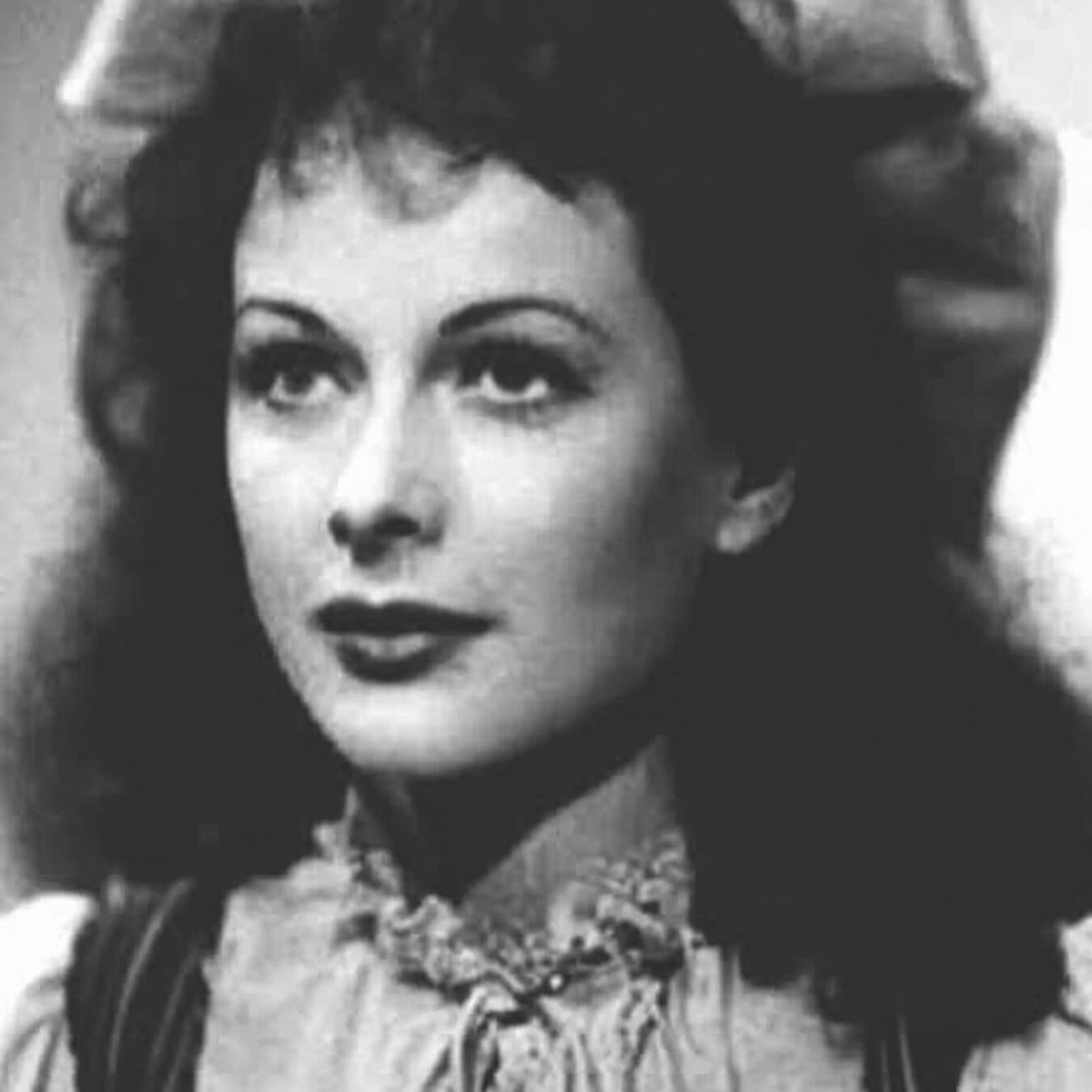 TrumpGirlLove's tweet photo. They called her the most beautiful woman in the world, and for years that was the only story anyone bothered to tell. 

In 1933 a young Austrian actress named Hedwig Kiesler appeared in a film called Ecstasy that showed her nude and, more shockingly for the time, in the throes of pleasure. 

The scandal followed her across borders. When she reached Hollywood she became Hedy Lamarr, and the industry’s most powerful men lined up to put her on screen beside Clark Gable and James Stewart. 

Audiences came for her face. What almost no one noticed was the mind behind it.

She had grown up in Vienna as the daughter of a banker, raised around mathematics, physics, and the idea that systems could be understood and improved. 

After she married Friedrich Mandl, one of Europe’s richest arms manufacturers, she found herself at dinner tables where military men spoke freely about radio-controlled weapons and the weaknesses of wireless signals. They treated her as decoration. She listened.

The marriage became a gilded prison. In 1937 she left it, slipping away dressed as her own maid and carrying little more than what she could conceal. In Hollywood the public continued to see only the star. 

Lamarr, however, kept turning over the conversations she had overheard. Allied ships were being lost because enemies could locate and jam the single frequencies used to guide torpedoes. 

A signal fixed on one channel was easy to find and easy to block. What if the signal jumped rapidly among many frequencies according to a pattern known only to the sender and receiver? Even if one frequency were jammed, the message would continue on another.

The remaining problem was synchronization: how two machines could stay perfectly in step while constantly changing channels. 

She found an unexpected collaborator in the avant-garde composer George Antheil, who had once synchronized a battery of player pianos. His timing mechanism supplied the missing piece. On August 11, 1942, they received U.S. Patent No. 2,292,387 for a “Secret Communication System.”

The Navy reviewed the idea and set it aside. Too complicated, they said; an actress and a musician could not have solved a military problem. The patent was filed and forgotten. 

Years later, during the Cuban Missile Crisis, engineers rediscovering old patents recognized its value. Frequency hopping worked. In the decades that followed, the underlying principle became foundational to the spread-spectrum techniques that power Bluetooth, Wi-Fi, and GPS.

Lamarr lived long enough to receive the Electronic Frontier Foundation Pioneer Award in 1997. Fourteen years after her death she was inducted into the National Inventors Hall of Fame. 

The public had spent most of her life looking at her face. The technology she helped invent now sits, invisible and indispensable, inside the devices we carry every day. 🌹