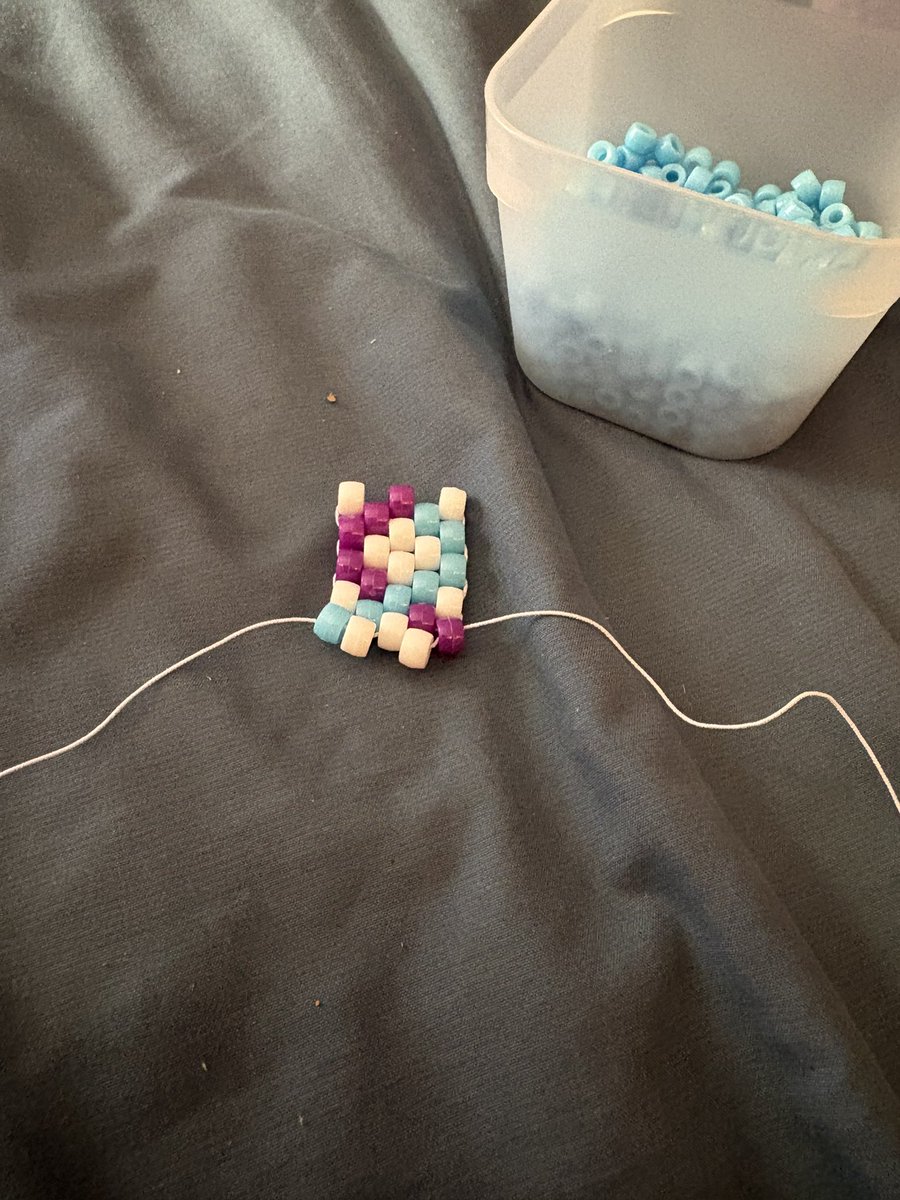 DelaneyParker10's tweet photo. I love using my days off to rapidly switch between different kinds of art very quickly at the same time. Row of beads, fanfic sentence, brief pause for the video essay I’m watching, life is good https://t.co/pcJqw42zkn