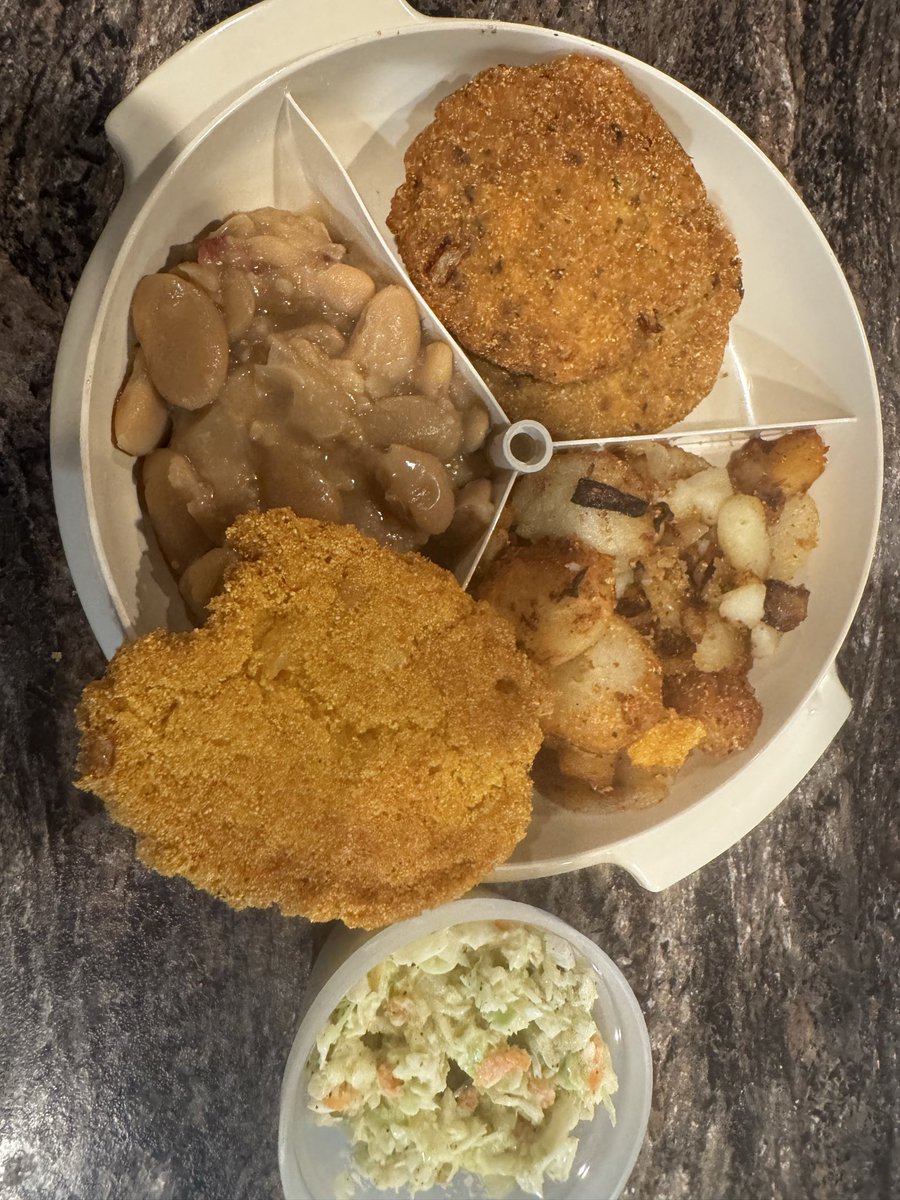 GRANNA80188211's tweet photo. Hot water onion cornbread sitting on top between Butter beans,and fried potatoes,salmon patties and coleslaw in the bowl. My supper hubby lunch/supper whatever you call it when you working nights.the beans I canned last year,that’s how I was able to get on this ready in an hour 😊