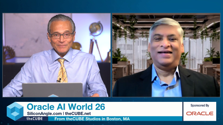 A split-screen broadcast from Oracle AI World 26 sponsored by Oracle, featuring two men in a video interview setting with theCUBE Studios in Boston, MA, displayed through SiliconAngle.com and theCUBE.net.