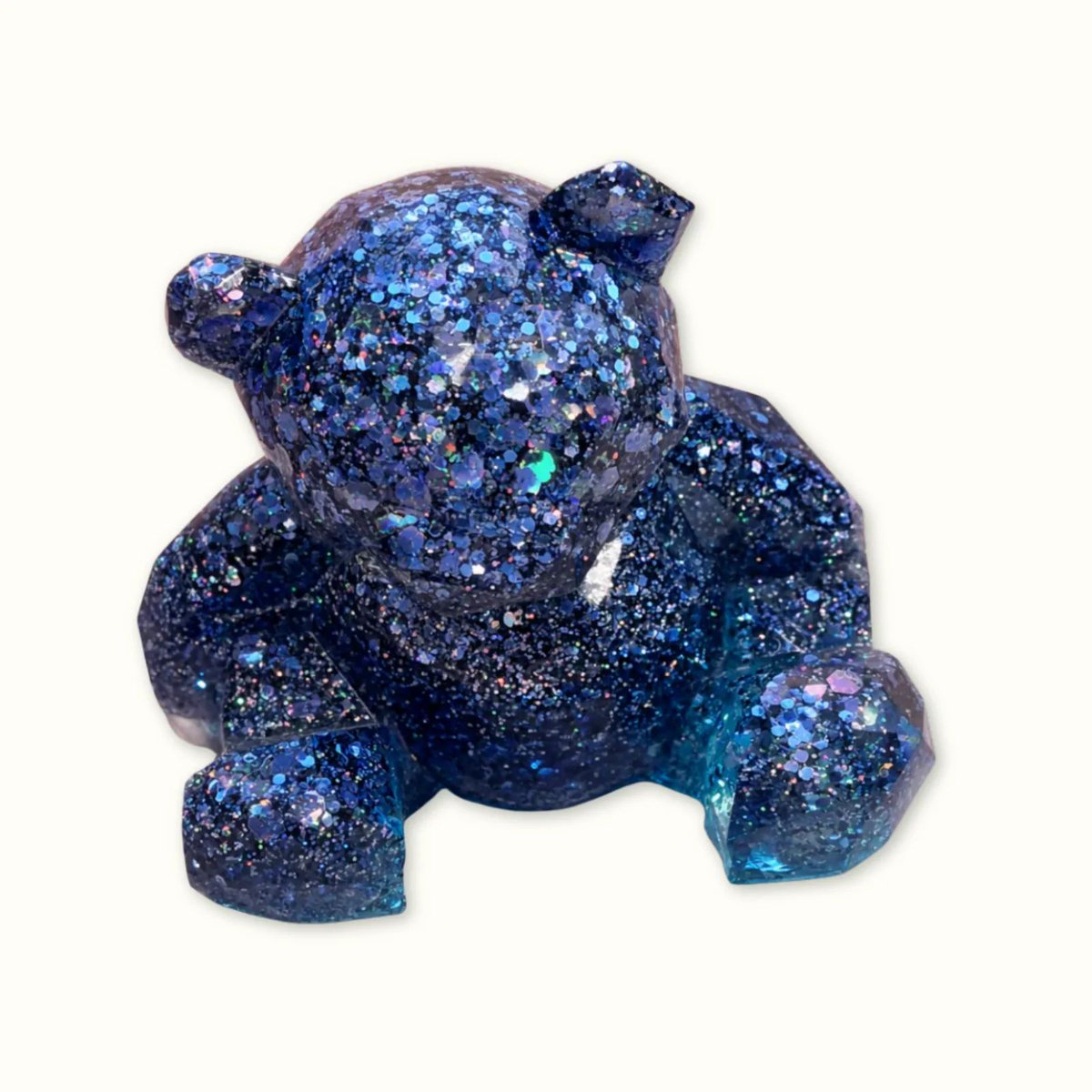 Poxy_Roses's tweet photo. I poured layers of blue and celestial glitter into this little bear and honestly he looks like he holds the night sky. One of a kind. ๐ปโจ #resinart https://t.co/51QPcmREvF