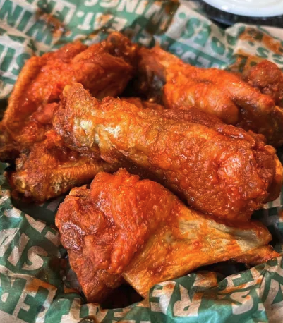 Polymarket's tweet photo. JUST IN: Wingstop announces new chicken wings covered in Sour Patch Kids candy, launching nationwide for a limited time starting October 27. https://t.co/QjrB5mfam9