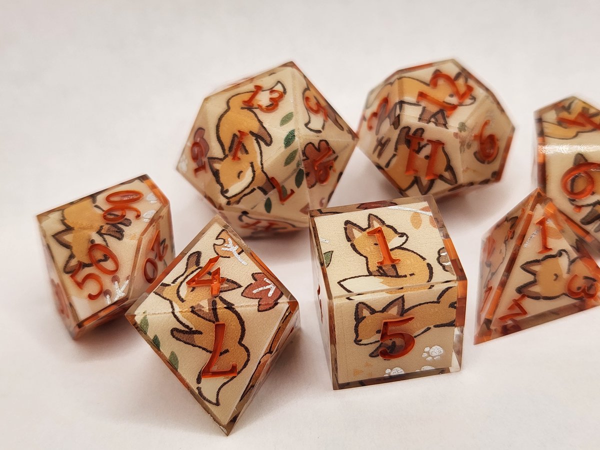 Sinnamon_Dice's tweet photo. Fall Foxes Dice Set with Orange Numbering 🍂
#dnd #ttrpg #handmadedice #dice #dungeonsanddragons https://t.co/4AWYCK7ijt