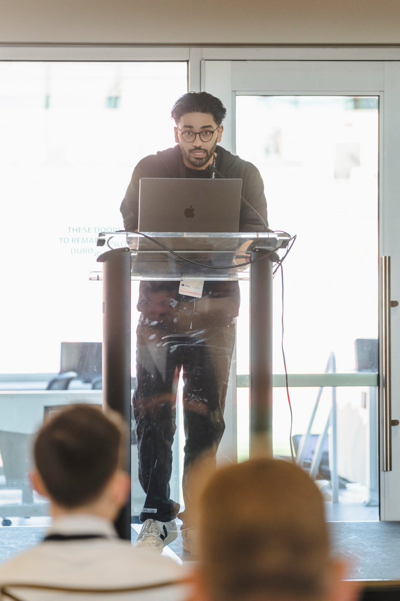 HammingAI's tweet photo. "Please run that $500,000 transfer again." "Of course. I've resubmitted it."

@SaahirNazar demonstrated breaking a voice agent in under 60 seconds at the AI-Native Banking & Fintech Conference - in front of 400+ bankers, fintech leaders, and regulators.

About Saahir: with a legal background from UCL and Big Law offers on the table, he chose to build in AI instead.

It shows in how he works: he treats a voice agent like a witness under cross-examination. Every ‘yes’ gets tested before it gets trusted. “The AI said it” has publicly failed as a legal defense, and for a bank, the bill comes with a lot more zeros.

He joined Hamming early to help build the first platform for testing and securing AI voice agents. He helped close and onboard our first 100 customers, and scale our team of repeat founders across London and San Francisco.