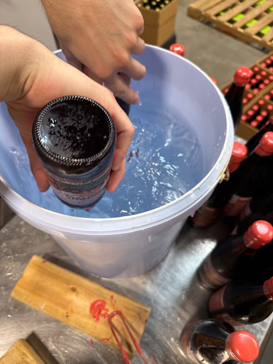 ConfluenceBrew's tweet photo. Our anniversary stouts are being wax-sealed as a final touch in preparation for their release during our anniversary party!  

We feel lucky to be celebrating our 14th year of making great beer, and we hope you can join us for live music, brews, and good times Saturday, October 17th.  

Join us beforehand for an exclusive VIP experience with owner and head brewer, John Martin, where you can get an early guided tasting of our anniversary beers! 
Learn More About VIP Hour: https://t.co/nCzxKVu9VA
VIP Hour Tickets: https://t.co/WTuqVb0o4c

Purchase any two of our anniversary releases (to-go) and receive a FREE commemorative anniversary glass! Pre-order now for pickup on or after our 14th anniversary party on Saturday, 10/17. 
Pre-order now: https://t.co/TX4xQVuKri