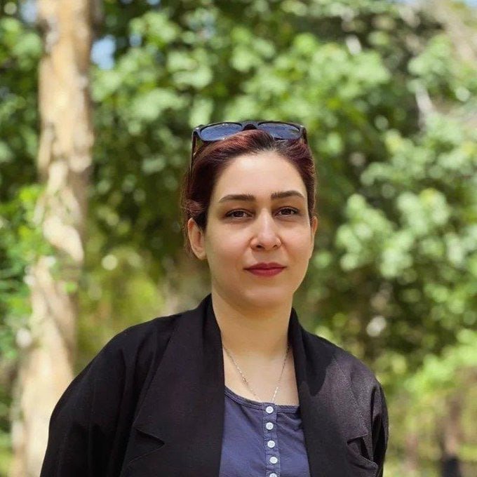 IranNewsAgency0's tweet photo. 🚨Don’t stop talking about Iran.
Nasim Pouraghaei took her final breaths in her husband’s arms. A mother of two, reportedly shot in the head and neck in Tehran on January 8, 2026. Her husband held the woman he loved as her life slipped away, knowing their children would never see their mother come home again. During those two days of bloodshed, activists have cited more than 100,000 Iranians killed, a figure that remains disputed and difficult to independently verify. Nasim was one of those lives. A wife. A mother. A daughter of Iran. She should still be here. Never forgotten.