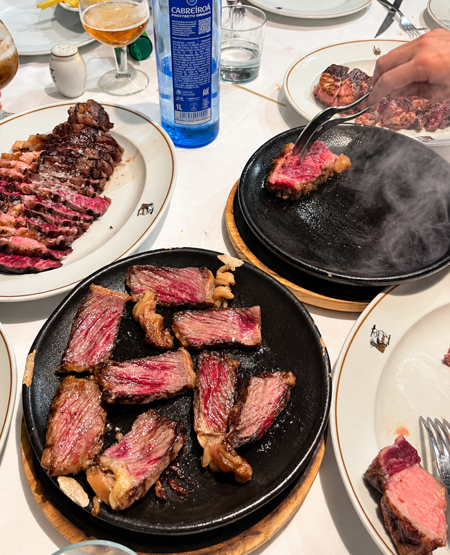 RenoirGuides's tweet photo. #madrid We returned to Mesón Txistu Madrid, a #Basque restaurant a little off the beaten track.
Their famous #Chuletón Txistu (beef chop) is served sliced, with hot plates brought to the table so diners can cook the beef to their liking, though the sizzling meat can make the dining room quite smoky. The beef is excellent.
It remains resolutely traditional, specialising in excellent grilled meats, fish and classic Basque dishes.