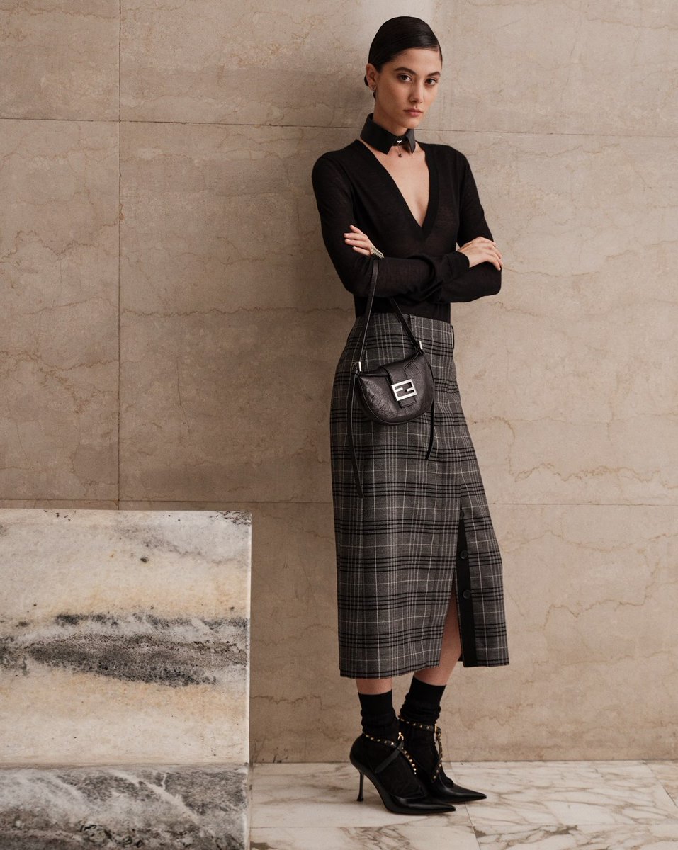 Fendi's tweet photo. Black and pergamena lines against gray create the new Check motif across sharp sartorial silhouettes

FENDI Cruise 2027 by Maria Grazia Chiuri

Launching October 22nd in boutiques and on the House's official site

© Marco Imperatore https://t.co/7OL6AIQ6bo