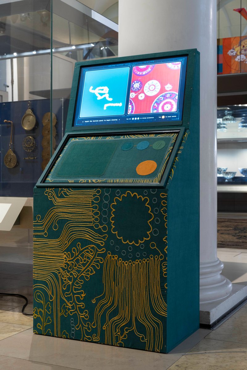 GAZELL_iO's tweet photo. https://t.co/ZL1moyEccT NEWS | Aziza Kadyri at the V&A  

Now on view at V&A South Kensington, Sender Unknown is a new site-specific installation by #AzizaKadyri, exploring the intersection of AI, craft, cultural memory, and authorship.  

Responding to the #museum’s historic suzani collection, the work brings together embroidery, digital textile printing, and bespoke #AIprocesses, with elements hand-embroidered by artisans in Nurota, Uzbekistan.  

The #installation forms part of the V&A’s Jameel Programme, with support from Community Jameel and the Sarikhani Family, and is curated by Carrie Chan and Fuchsia Hart, with Faunsia Tucker as producer.  

Kadyri was a https://t.co/ZL1moyEccT Artist-in-Residence in November 2025, where Play Nice explored related questions around identity, heritage, and emerging #technologies.  

On 17 October at 3pm, Kadyri will also join curator Carrie Chan for a conversation at the V&A on Sender Unknown and the role of technology in preserving and reinterpreting cultural histories.  

Photos: Timothy Readhead @ V&A South Kensington.

#GAZELLiO #DigitalArt #TextileArt