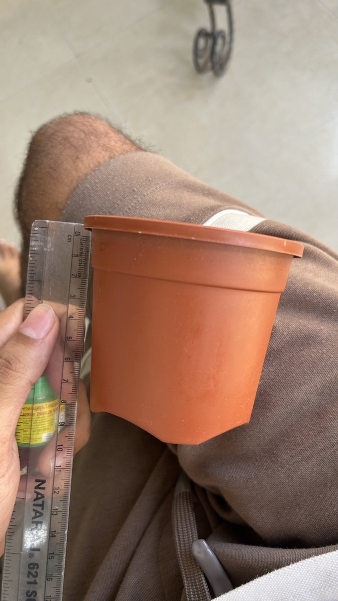 thecineasts's tweet photo. @TataCLiQCare @TataCLiQFashion 
I ordered the Ugaoo Brown Plastic Garden Pots (Set of 6) under Order ID 145207930, but the pot I received appears to be incorrectly sized compared to the product listing. The listing mentions 14 cm height, but the received pot measures differently. https://t.co/NeszMyWPKM
