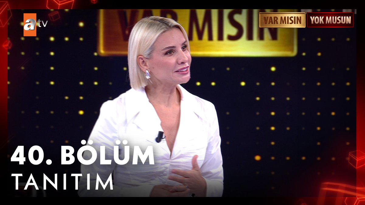 A blonde woman in a white blouse speaks on a Turkish TV show called 'VAR MISIN YOK MUSUN' on atv, with on-screen text reading '40. BÖLÜM TANITIM' indicating a 40th episode promo.