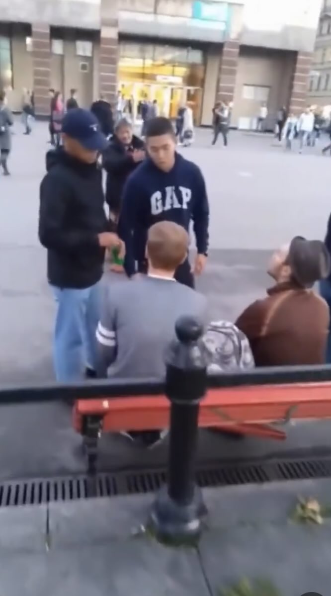Abshiro32's tweet photo. An elderly woman in Russia was carrying two heavy bags, so she asked two young Russian men to make room for her to sit down, but they refused and used abusive language toward her. https://t.co/IYCHP3JgNc