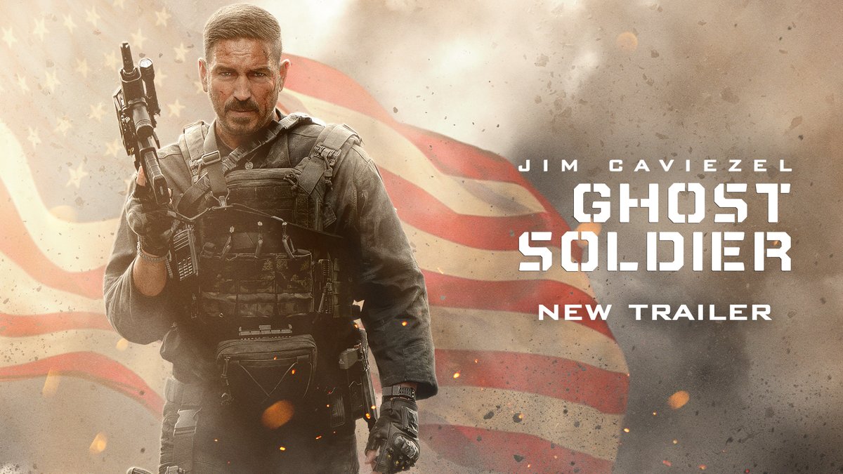 The promotional image for the film "Ghost Soldier" features actor Jim Caviezel in tactical military gear, holding a rifle in front of a weathered American flag backdrop with embers floating around. Text on the right side reads "JIM CAVIEZEL GHOST SOLDIER NEW TRAILER." The gritty, action-oriented poster aligns with the post's announcement that the film will be released exclusively in theatres on Veterans Day, 11.11.