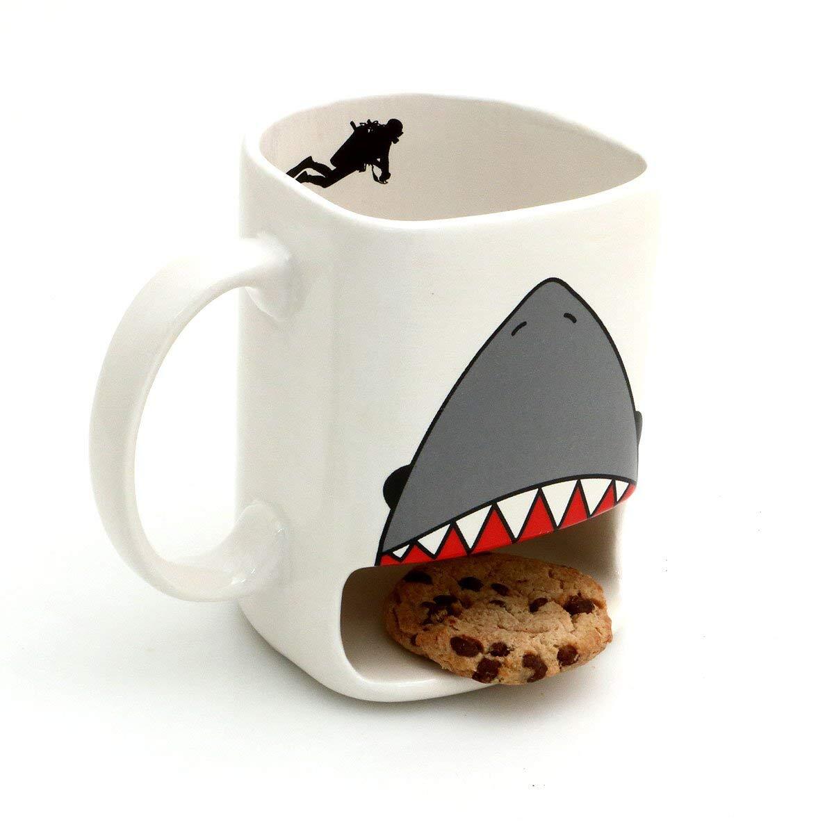 UnicunShop's tweet photo. Honestly, I’ve found the perfect mug for my snack game! 🦈 This Shark Week mug actually has a built-in spot for your cookies so you can dunk without needing a plate. It's such a vibe. Check it out here: https://t.co/U432rekiZh

#SharkWeek #CookieDunking #GiftIdeas https://t.co/I0leW2vckD