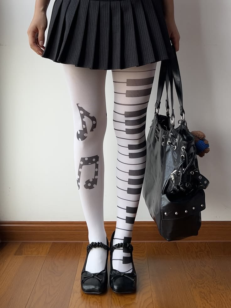 synkholiday's tweet photo. Kris wearing piano-themed fashion items would genuinely heal me https://t.co/WCnQeLmqcN