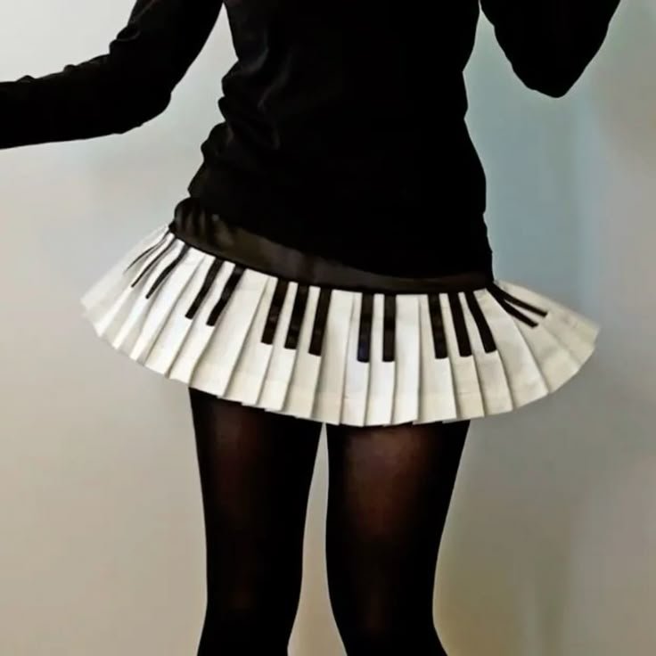 synkholiday's tweet photo. Kris wearing piano-themed fashion items would genuinely heal me https://t.co/WCnQeLmqcN