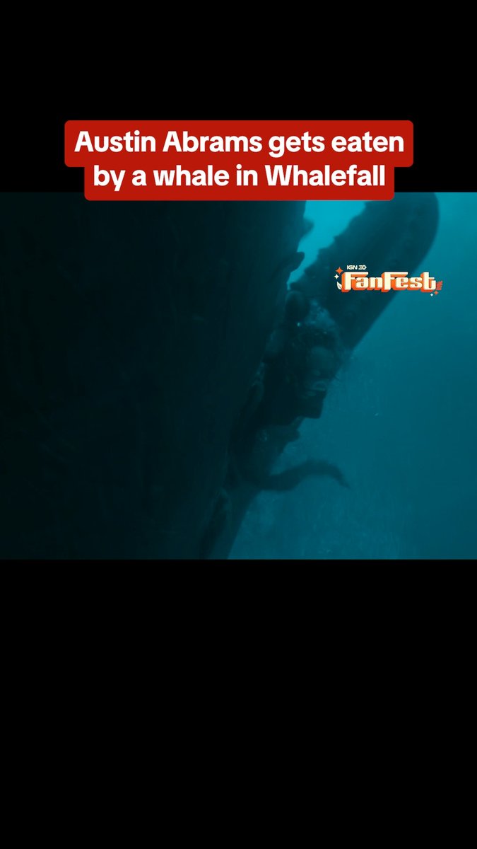 The underwater image shows a person swimming through a whale's baleen-filled mouth, illustrating a scene from the film "Whalefall." Text at the top reads "Austin Abrams gets eaten by a whale in Whalefall," with an "IGN Fan Fest" logo visible in the upper right corner. The image connects to the post by visually depicting the "horrifying situation" Abrams' character faces in the film.