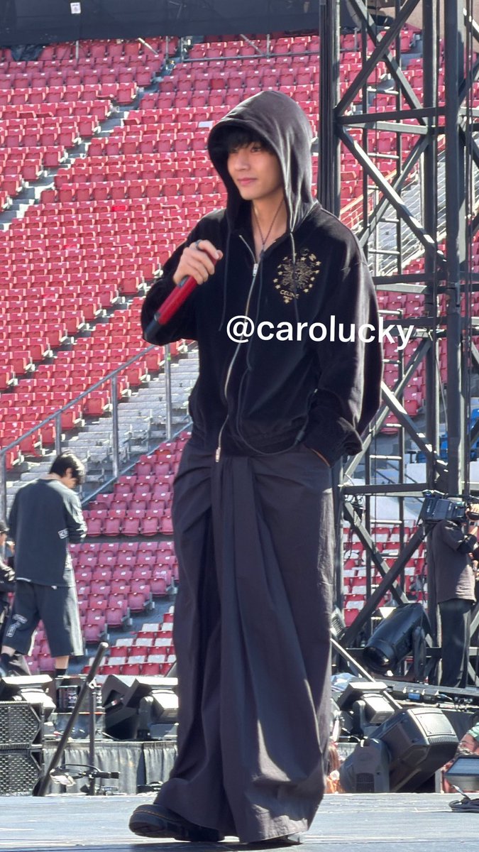 taeguide's tweet photo. Taehyung wearing black lungi trousers from Japanese designer brand JULIUS retailing for $1241 https://t.co/UnOIa43Hgc