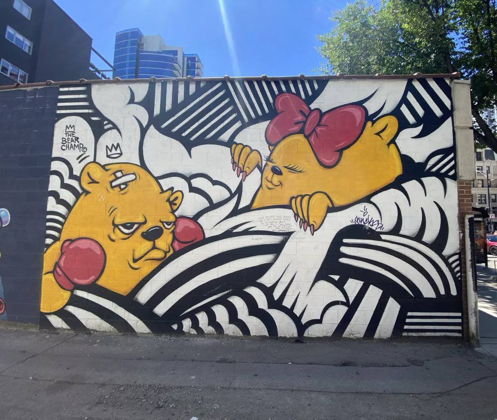 bearchampxrpl's tweet photo. FROM THE STREETS OF CHICAGO TO TIMES SQUARE. 🐻🥊

JC Rivera's Bear Champ on the video boards at Nasdaq.

The artist himself painting live.

Evernorth × Bear Champ.

This is what happens when ART, CULTURE, and COMMUNITY meet opportunity.

The XRPL has culture.

AND THE WORLD IS WATCHING. 👑
