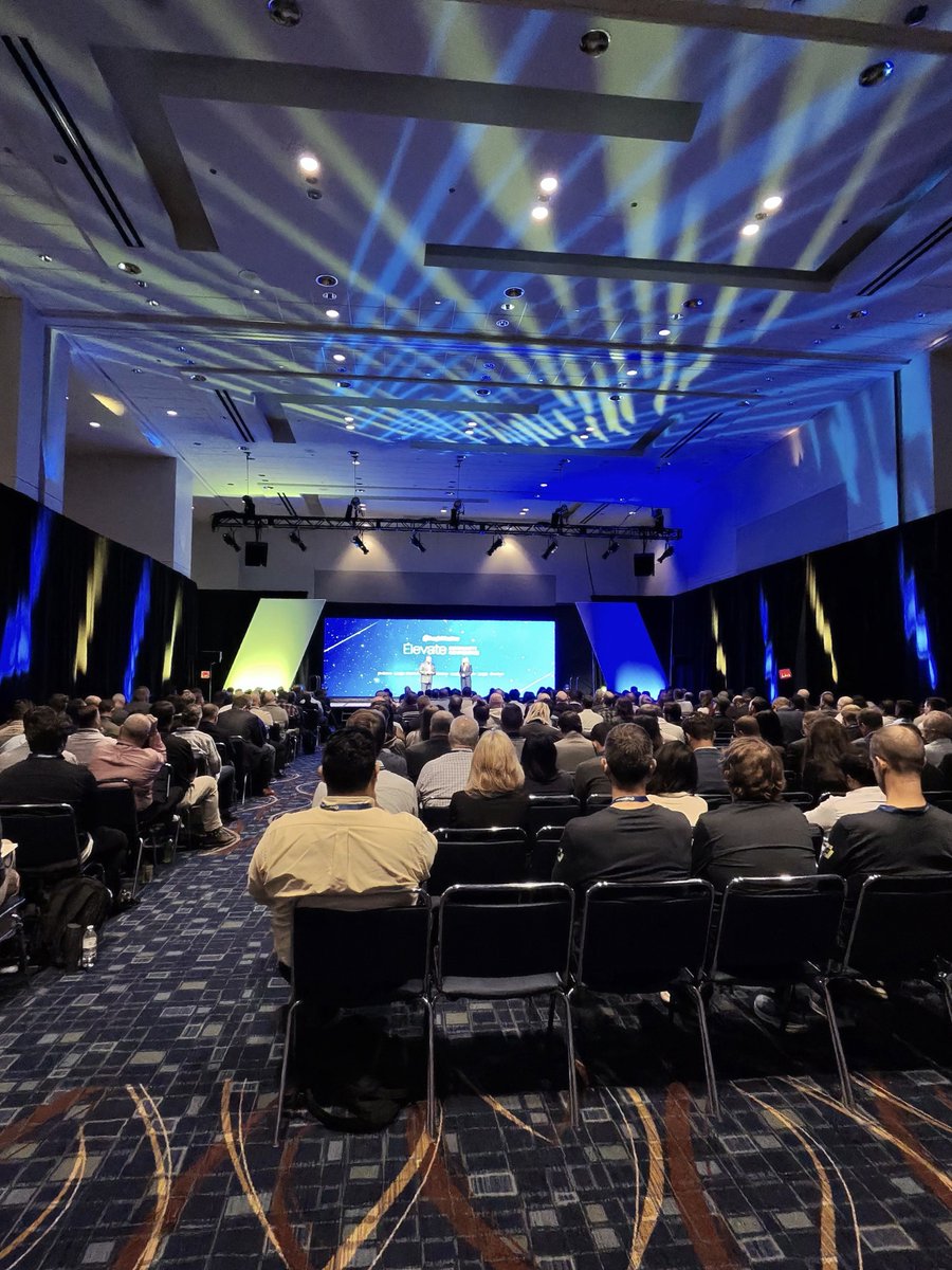 LogicMonitor's tweet photo. #Elevate2026 opened with CMO Brooke Cunningham on the alert loop IT teams know well. Then CAIO Karthik Sj &amp; CTO Prabhu Anand Nakkeeran showed how the LogicMonitor platform help teams investigate issues, and recommend next steps, with people in control. Next up: breakout sessions! https://t.co/2nU3HSwCMJ