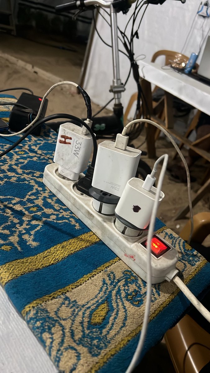 Osama_Gazaa's tweet photo. We are suffering from charging the phone and we go away and are jeopardised so that we can charge the phone and communicate with you to check on us 💔😭 https://t.co/1fYhuAugdu