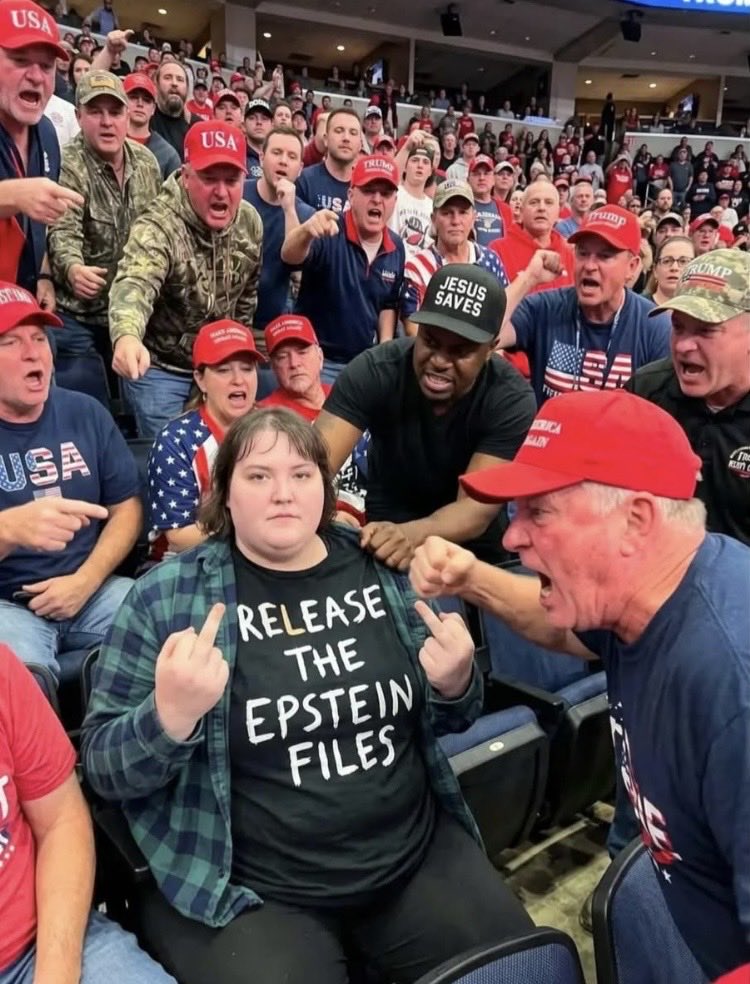 Suzierizzo1's tweet photo. If you could say one thing to the woman that was attacked by MAGA Trump supporters at a rally for wearing a Release the Epstein files shirt what would it be? https://t.co/rGFEWFJPUc