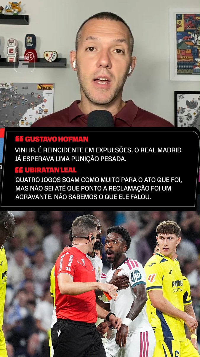 The image features a man in a maroon shirt with white earbuds speaking into a microphone, with a Brazilian sports commentary overlay showing quotes from "Gustavo Hofman" discussing Vini Jr.'s repeated expulsions and "Ubiratan Leal" noting that four games seems like a heavy punishment. Below the text is a photo from the match showing Vini Jr. (in white Real Madrid kit) confronting a referee in red alongside Villarreal players in yellow, including one wearing "hp" sponsor and another with "PAMPA" branding.