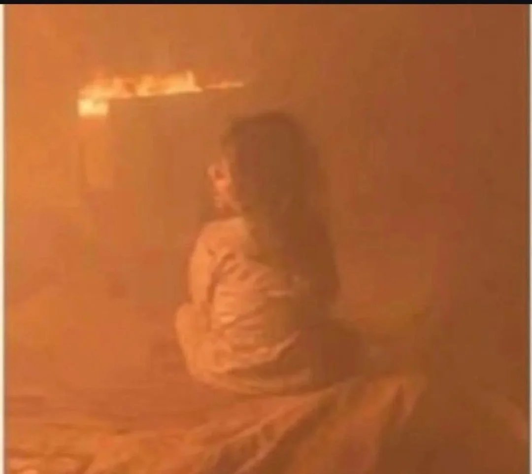 clashreport's tweet photo. 📸 Gaza: A 3-year-old girl watched her mother burn to death after an Israeli airstrike hit their apartment.

Maryam Ghanem was found on a bed surrounded by flames and heavy smoke in the Al-Rimal neighborhood, her mother Reem Asaad Awad, 33, burning nearby. 

Maryam suffered burns and was treated at Al-Shifa Hospital. 

Her father was already killed earlier in the war — her grandmother is now her only family. 

Israel claimed the strike targeted a Hamas member but gave no evidence.