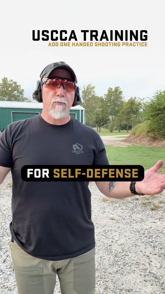 A man wearing ear protection and safety glasses stands outdoors with text overlays reading 'USCCA TRAINING ADD ONE HANDED SHOOTING PRACTICE' and 'FOR SELF-DEFENSE'.