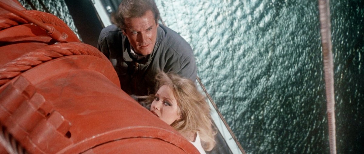 RogerMooreFan's tweet photo. A View To A Kill gets too much hate. Yeah Roger was 57, yeah his mole is missing and yeah you can see his stuntmen in certain scenes. But, it is still a first-rate thriller, with great stunts, a fantastic John Barry score and the best 007 song ever by Duran Duran. https://t.co/HhrRff3hmx