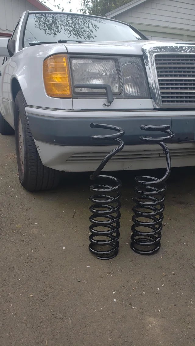 AlexEdgerton's tweet photo. Somewhere in Germany, 1985:

“Karl, wie must move the spring for the axle on the AWD version.”

“Nein, Klaus, I have ein fantastisch
idea! Hold mein Bier” https://t.co/6aKtITcYEH