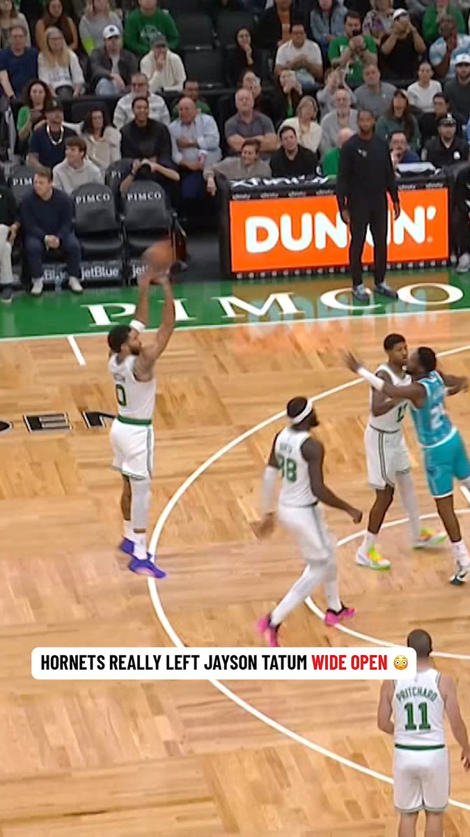 Jayson Tatum (#0) rises up for an uncontested jump shot after the Hornets' defense left him wide open, with teammate Pritchard (#11) trailing the play. The caption "HORNETS REALLY LEFT JAYSON TATUM WIDE OPEN 😳" highlights the defensive breakdown that gave him too much time to shoot.