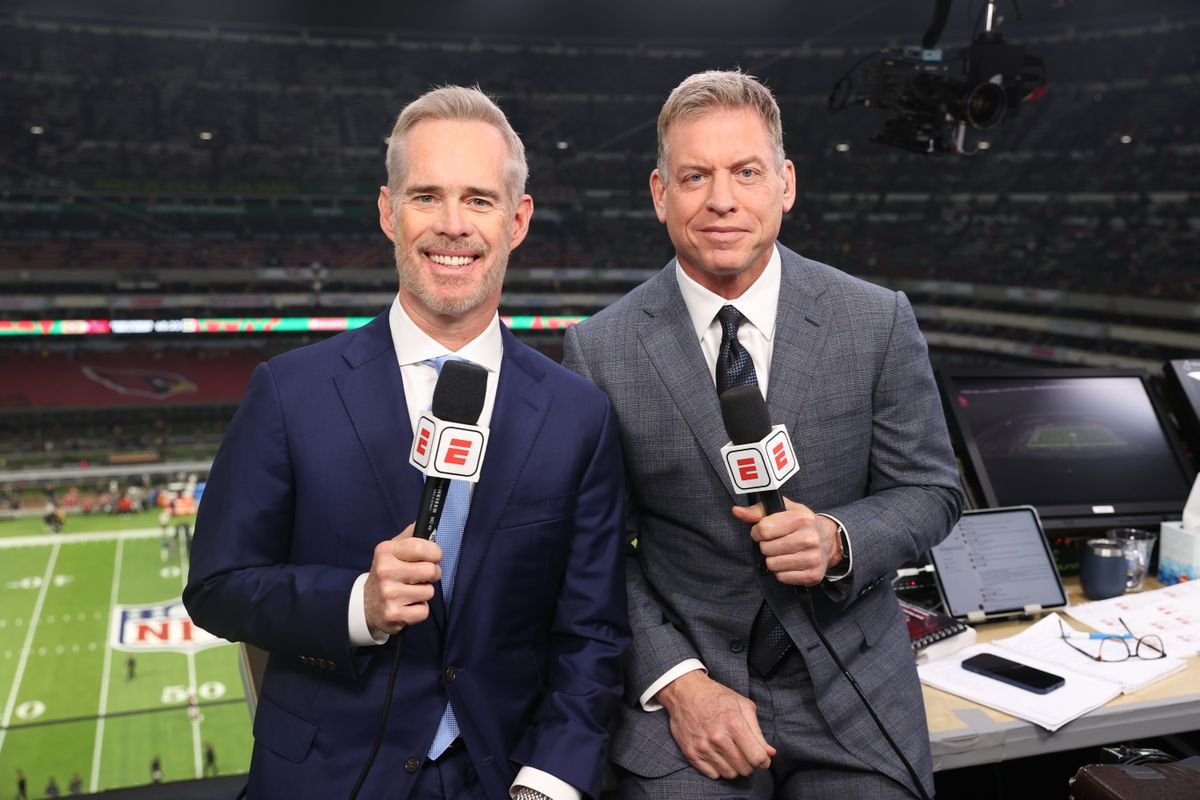 DesireeAmerica4's tweet photo. When they jumped to ESPN in 2022, Troy Aikman was the alpha, pulling over $90M while Joe Buck took $65M. Troy walked in like the main event, convinced three rings made him the reason fans tuned in.  

​Four years later, the tables turned. Buck just secured a massive $108M extension through 2031, while ESPN hasn’t even made Troy a formal offer.

​Before Monday night’s kickoff at SoFi, that tension exploded. Buck tried to clear the air, and Aikman’s bruised ego erupted into a heated booth argument right before airtime.

​Is Troy acting like an entitled diva because his partner eclipsed him, or is ESPN doing a Hall of Famer dirty?