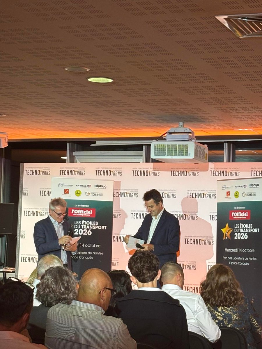 AFTRAL's tweet photo. À l’occasion des Étoiles du Transport 2026, organisées par L'Officiel des transporteurs au salon Technotrans, Loic Charbonnier, Président délégué général d’AFTRAL, a eu le plaisir de remettre l’Étoile du jeune dirigeant à Katy et Maxime Tarot, à la tête des TRANSPORTS TAROT (53). https://t.co/KC1Dtv3jyb