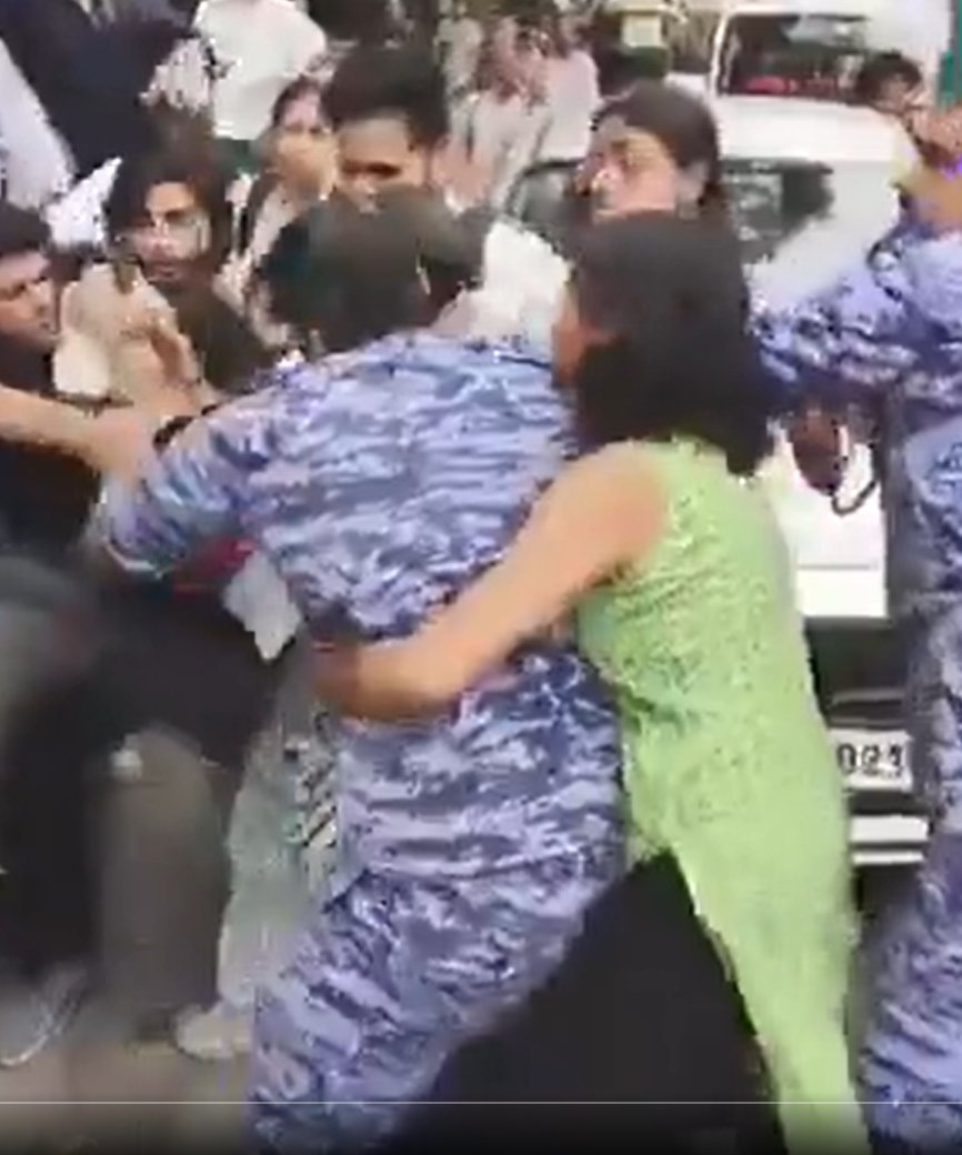 kavyageet's tweet photo. Why this lady is grabbing a male RAF personnel like this....Is it not the violation of cultural senstivity that India holds and those blaming CRPF should reply about such illegitmate behaviour. 
What if opposite have happened!! There are many instances like this that leads to serious mental suffering of CRPF and RAF men on ground!!!

#Protest #CEC #election #Gyanesh #INDIA