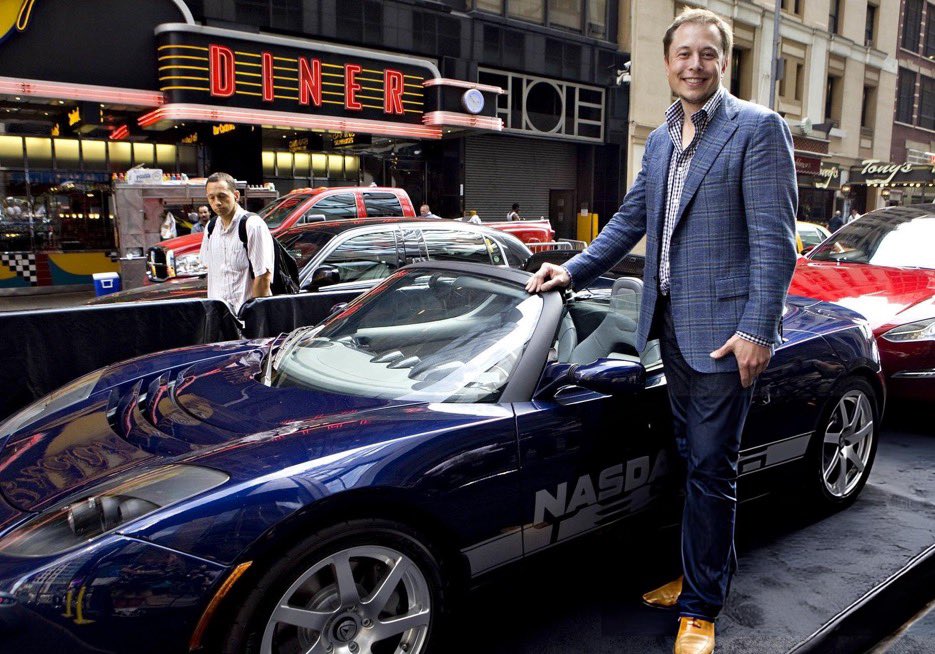 cb_doge's tweet photo. 16 years ago, Elon Musk with a Roadster on Tesla’s IPO day. https://t.co/ZbId3vloUU