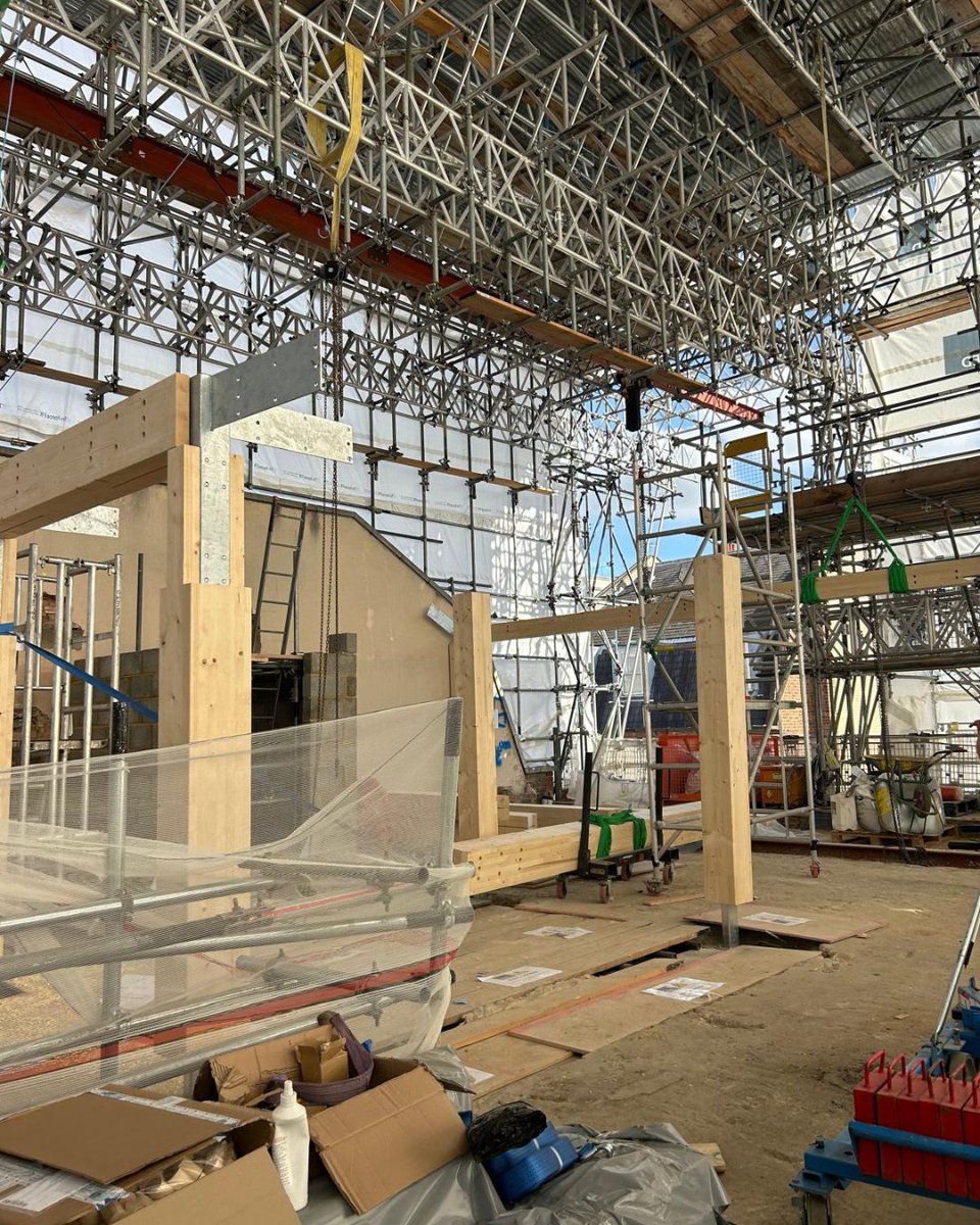 BucklandTimber's tweet photo. Installation underway at Bruton Place, Mayfair. Spruce GL32 glulam from HASSLACHER, with some tricky connections to work through. Hats off to Oli from Buckland who is supporting Mint with the installation. Main contractor: RED #Glulam #StructuralTimber https://t.co/nPeMQJZHOF