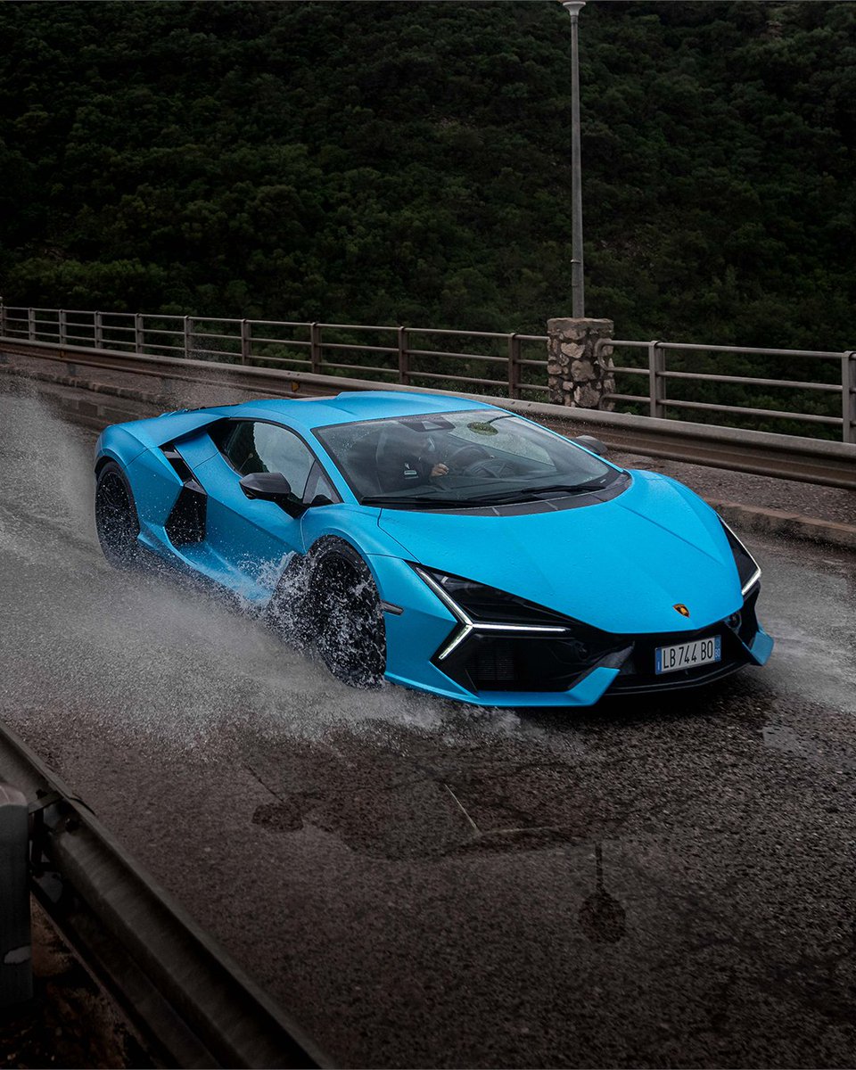 Lamborghini's tweet photo. Grey skies. Wet roads. Every reason to keep driving Lamborghini Revuelto.

#Lamborghini #Revuelto #FromNowOn https://t.co/M43LxAqxfL