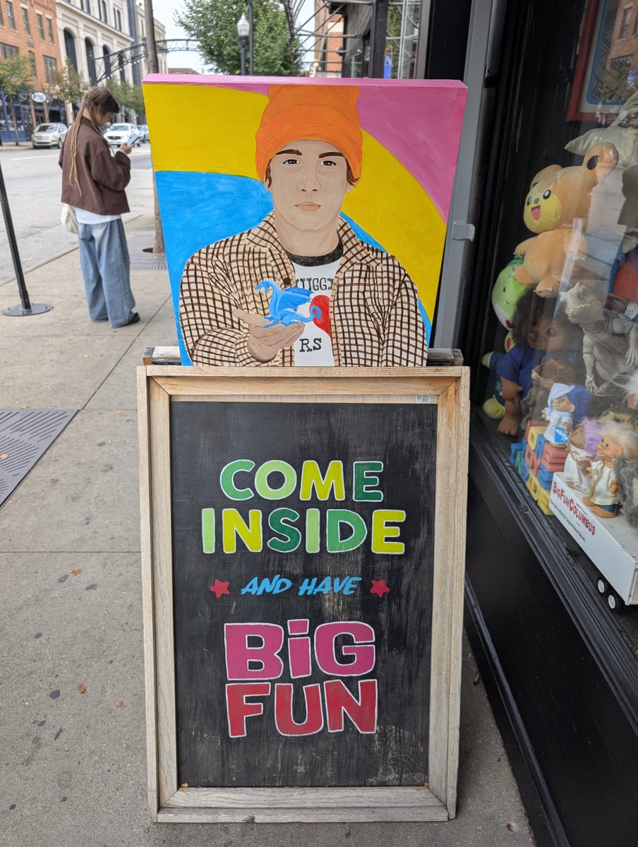 TOPUPDATERS's tweet photo. Big Fun has art from @/felicity_paints (on Instagram) up in front of their store! They also have little Jim Dun and Trash figurines, the Josh Big Fun Ringer tee, and a version of the Tree Huggers shirt! ♥️ https://t.co/cjhROJYVYS