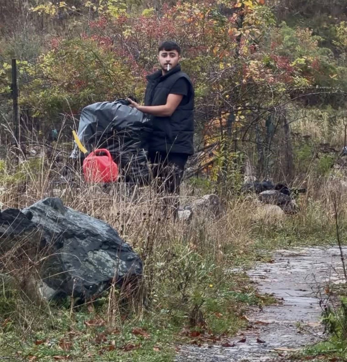 bears_aware's tweet photo. Saint John, New Brunswick:
This man was caught dumping multiple bags of garbage at a playground and even threw some into the Saint John river. 
We need harsh punishments for illegal dumping before Canada is turned into a third world country. https://t.co/8YRM597HUJ