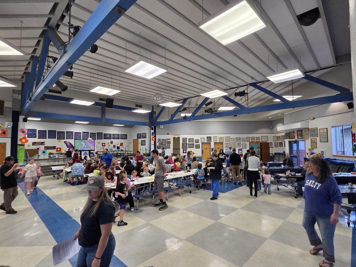 chris_schumaker's tweet photo. ELA Night at our Elementary School. PIZZA, the Seahawks game on the TV, many reading activities to engage in, the VFW promoting their book reading contest, Book Fair, prize drawing, and a local author reading her book. YES, it was a great community night. https://t.co/wM9n4rYAAj