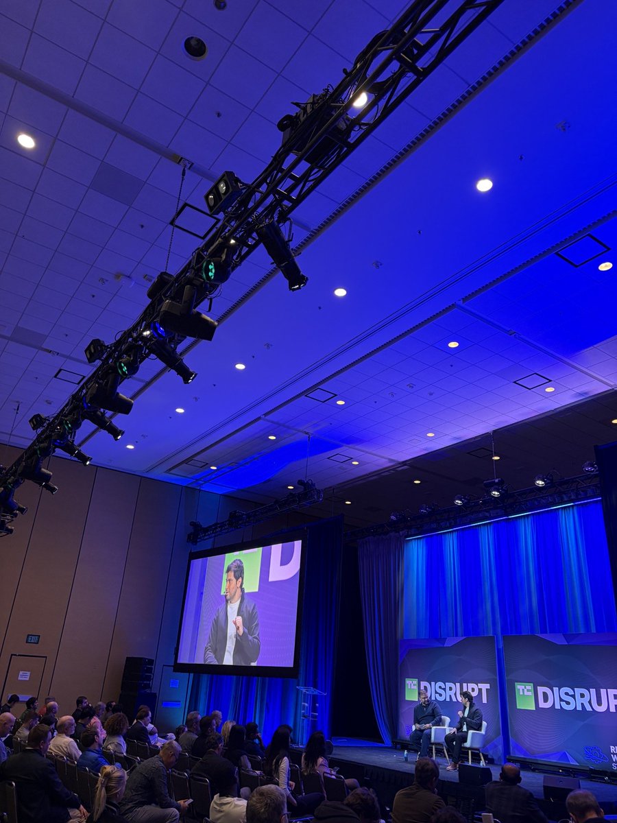 VarunOnAI's tweet photo. Enjoyed hosting @deepakpathak , Co-founder & CEO of our portfolio company @SkildAI, at @TechCrunch Disrupt yesterday.

One of my favorite moments was Deepak reflecting on what he’s had to unlearn as a founder. He once believed you could build a general-purpose robotics platform and leave deployment to others. The reality is far messier. Deployment is an integral part of the research loop, not something you can outsource while the technology is still maturing.

Equally telling was his observation that customers care most about how quickly a robot can be deployed and deliver value. That makes in-context learning a critical piece of scaling general-purpose robotics.

Skild recently crossed $100M in ARR, and they’re just getting started.

#PhysicalAI #Robotics