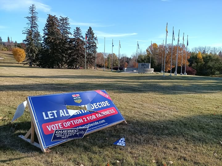 Zone3Garden's tweet photo. This picture is from Facebook. 

It was taken at Confederation Park in NW Calgary. Talk about heartbreaking irony - federalists destroying property in front of a monument to confederation.

Brutal. https://t.co/ItX7TX9a17