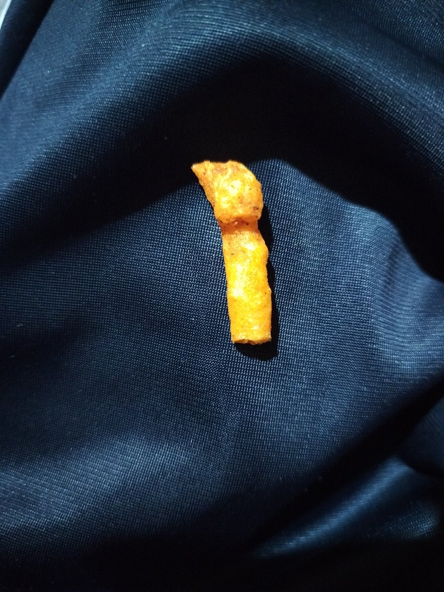 Easter_Toon_U02's tweet photo. //yooo I found a Cheeto that looks like Brusha's brush https://t.co/dtgWLLuQo5