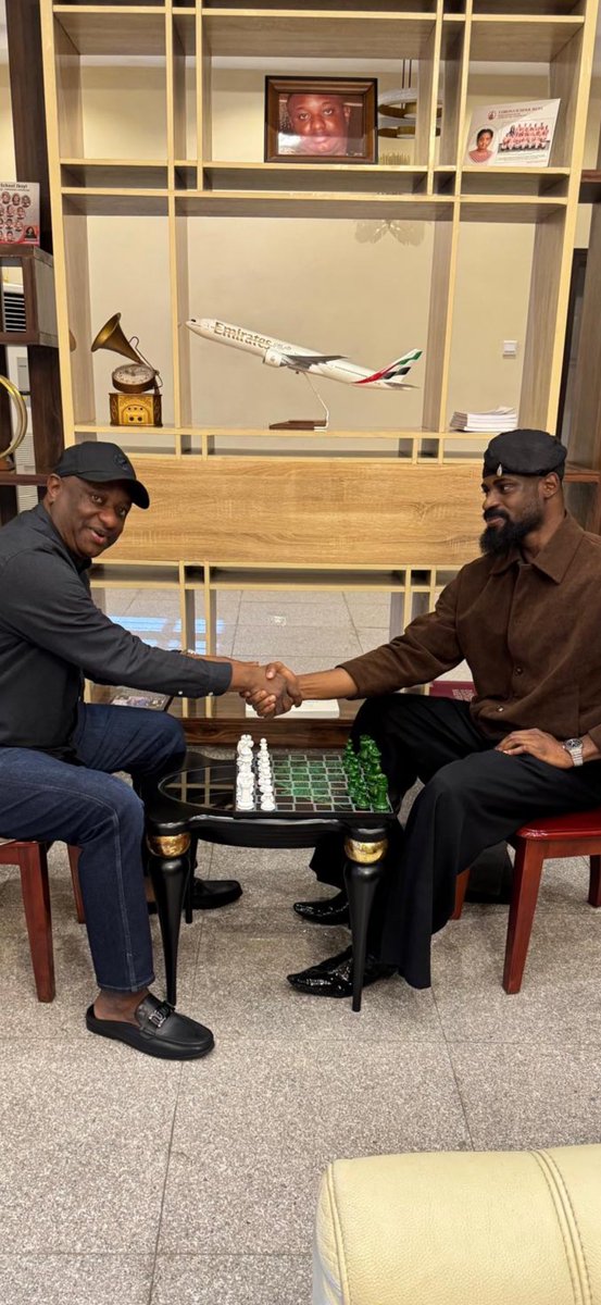 fkeyamo's tweet photo. Yesterday, I played host to Tunde Onakoya, the Nigerian chess master, coach, and founder of the non-profit organization CHESS IN SLUMS AFRICA. He holds the Guinness World Record for the longest continuous chess marathon, playing for hours in Times Square, New York. 

Mr. Onakoya payed me a courtesy call and presented to me an original Chess Board with green and white pieces, symbolising the colours of Nigeria. We also settled to a game of chess. 

Through the CHESS IN SLUMS AFRICA, he is able to teach chess to children in underprivileged communities. The project gives kids an intellectual identity, helps them get off the streets, and secures academic scholarships. I assured him of support for his cause.