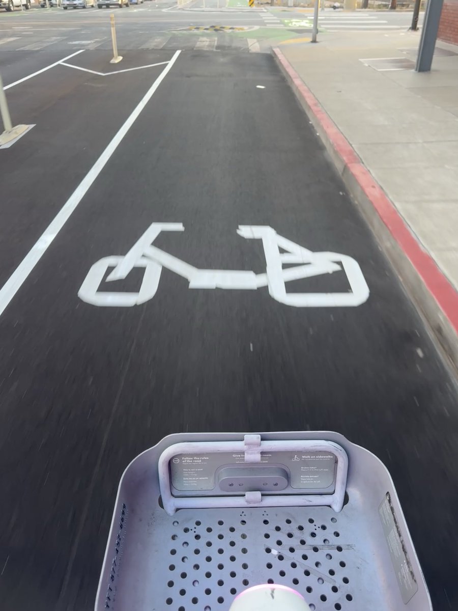 walk_hild's tweet photo. AI slop rampant in the streets of SF https://t.co/SDegDhNBgo